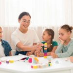 Montessori teacher conducting classroom activities with preschool children while demonstrating early childhood education skills